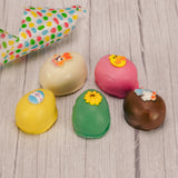 A smaller version of your favorite flavored cream eggs, all hand decorated with assorted Easter icing decorations. Each color egg is a different flavor. Choose from Yellow Coconut Cream, Pink Pecan Cream, Milk Chocolate Chocolate Cream, Green Vanilla Cream or White Peanut Butter Cream.