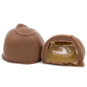 a chewy caramel center covered in smooth milk chocolate or rich dark  chocolate in a half pound box.
