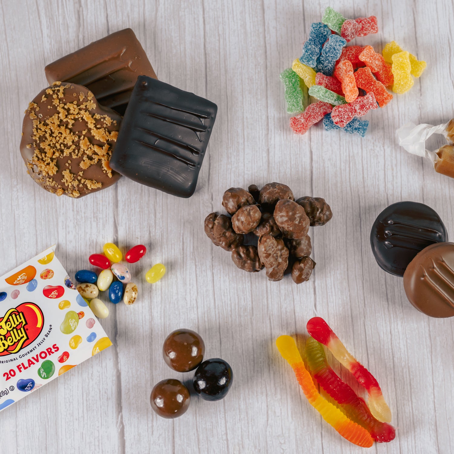 a collection of chocolate and non chocolate treats and snacks