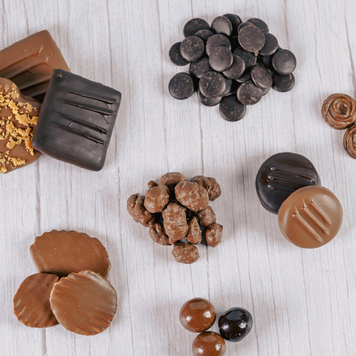 Chocolate treat collection. Includes milk and dark chocolate treats and snacks.