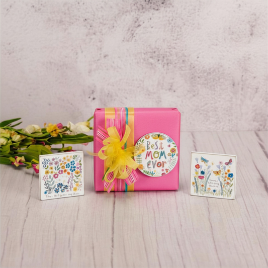 sampler box of assorted chocolates with a wooden mother's day magnet on top