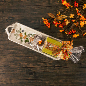 a long, rectangular ceramic fall platter would be great to any fall gathering and it has a little candy included, too!