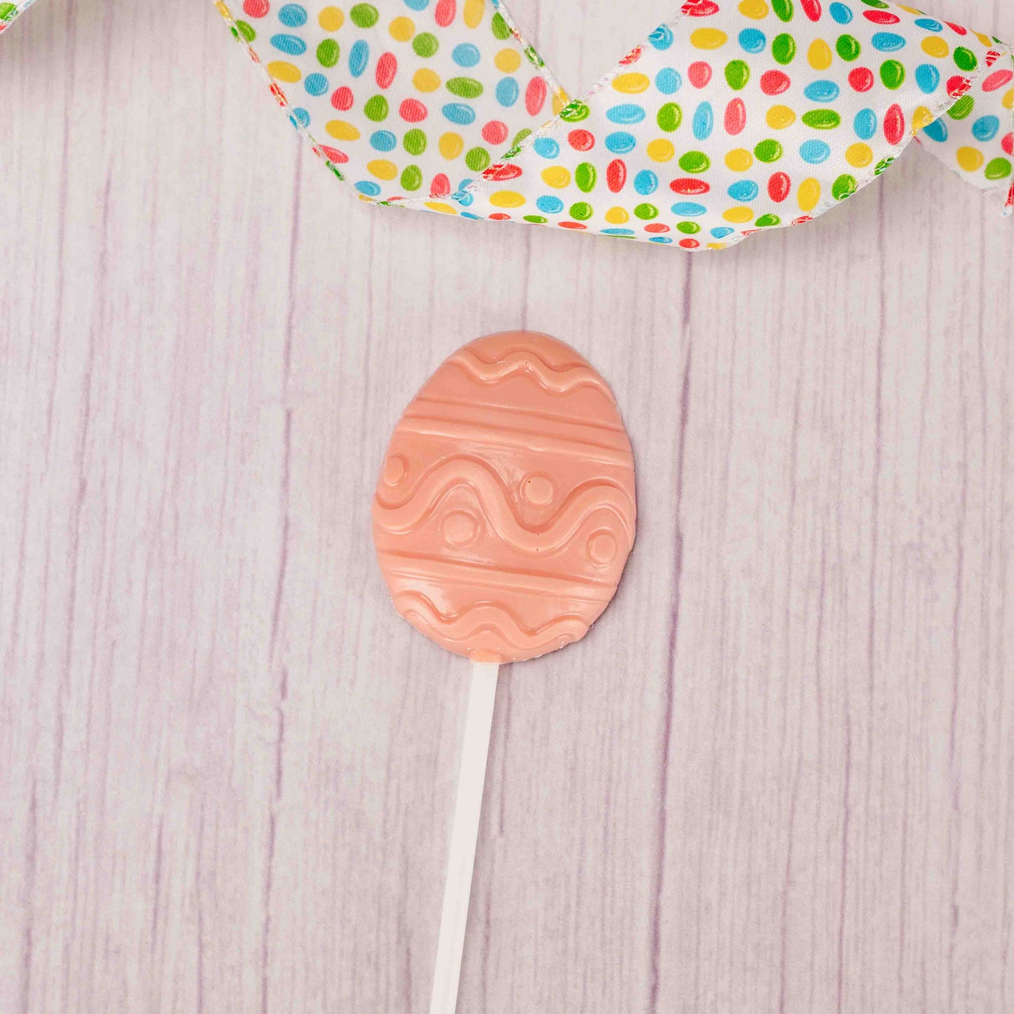 Celebrate Easter with these sweet egg suckers. They are sure to sweeten up all your baskets! White coating (tastes like white chocolate) flavor in spring colors like pink, purple, green or yellow.