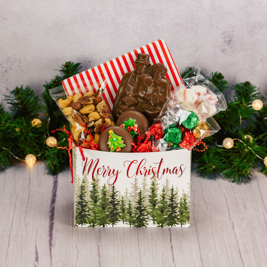 a small gift basket box that reads 'Merry Christmas' is filled with sweet seasonal treats for a large crowd to enjoy!