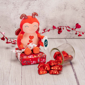 choose a pink or red lovebug plush to cuddle with and enjoy 3 oz. of Red Foil Milk Chocolate Hearts that come with it.
