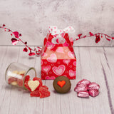 a lovely heart printed box with hearts, that would be perfect for a party favor or small gift. Filled with sweet treats.