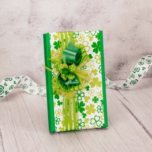 a one pound box of assorted chocolates wrapped in shamrock paper with a lovely handmade bow.