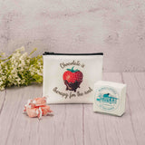 This small zipper pouch reads 'Chocolate is therapy for the soul', and features chocolate dipped strawberries on the back side. This is perfect to carry in your purse or bag. We filled it with a 2 oz. box of our divine Assorted Chocolates and four pieces of Strawberry Taffy.   