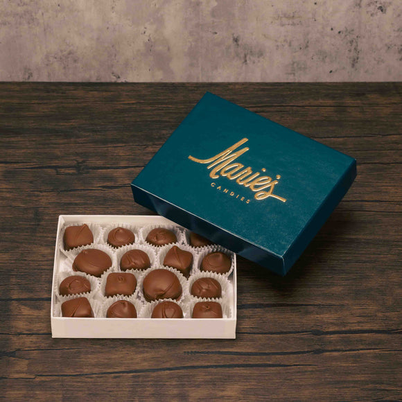 This all milk chocolate assortment contains all of your favorite soft center chocolates, including Butter Creams (vanilla), Chocolate Creams, Dutch Treats, Maple Creams, Peanut Butter Fancies, and Peppermint Patties. Approximately 16 creams.