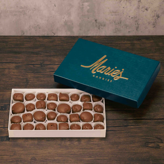 This all milk chocolate assortment contains all of your favorite soft center chocolates, including Butter Creams (vanilla), Chocolate Creams, Dutch Treats, Maple Creams, Peanut Butter Fancies, and Peppermint Patties. Approximately 32 pieces per pound.