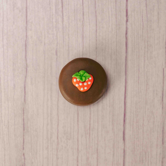 A crunchy Oreo cookie covered in smooth milk chocolate and decorated with an icing strawberry makes a perfect treat for spring events. Packaged individually.