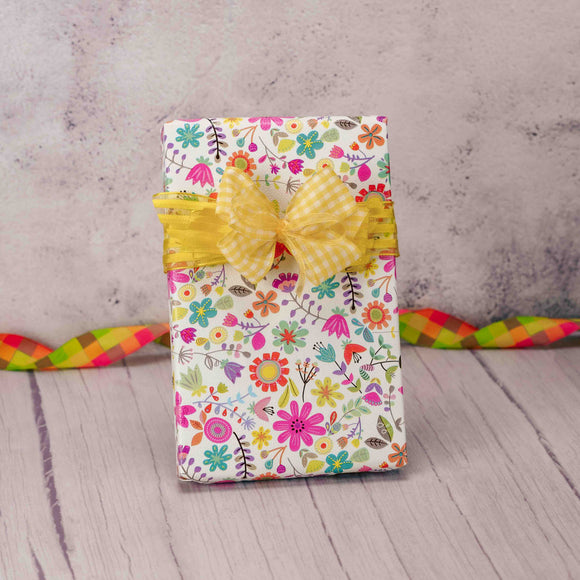 A half pound box of Sugar Free Assorted Chocolates is wrapped in beautiful flower paper and topped with a lovely yellow handmade bow for an added touch. Perfect for those that need sugar free candies and that deserve a gift!