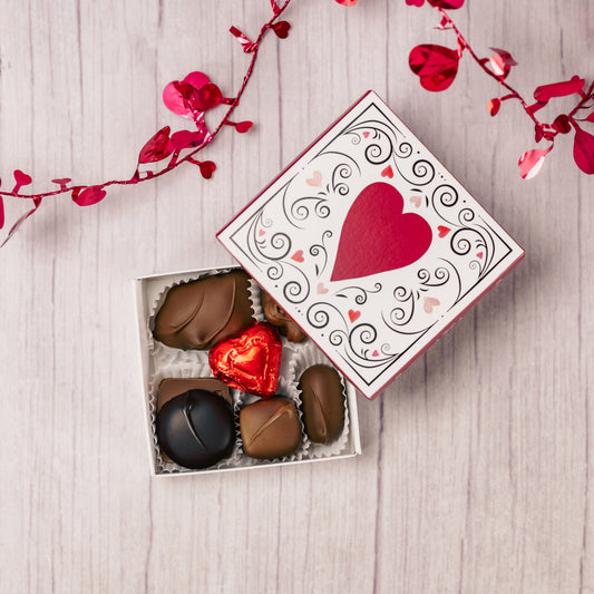a 3 oz. assortment of chocolates in a ornate Valentine box