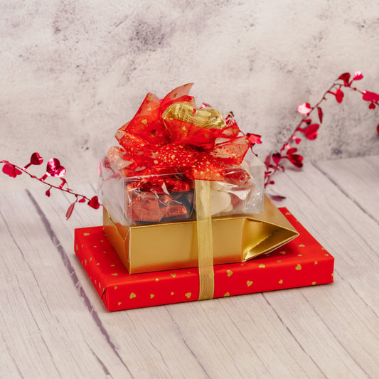 a large Valentine gift stack filled with sweet treats for all to enjoy!