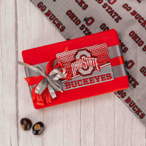 Stick this metal galvanized Ohio State magnet where others can see who you are cheering for! Be sure to devour the half pound box of our decadent Buckeyes, first! 