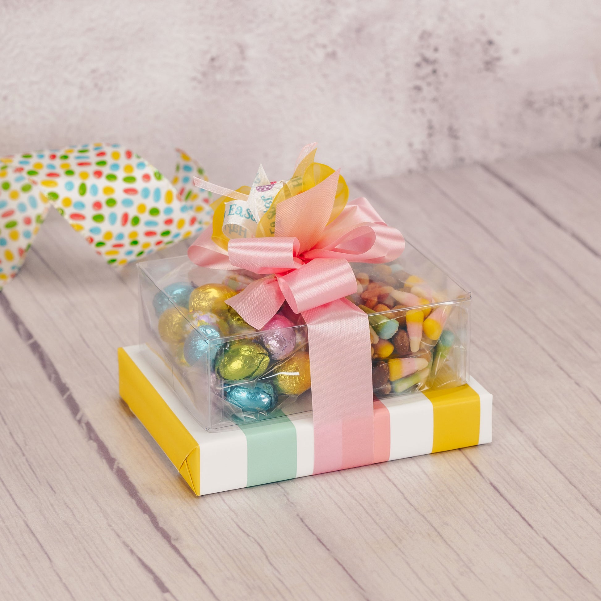 a small easter gift stack packaged with sweet treats