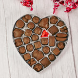 Say 'Happy Valentine's Day' with a classic heart shaped box filled with a pound of our exceptional Assorted Chocolates. Choose an assortment of all milk chocolates or a combination of all milk chocolates. 