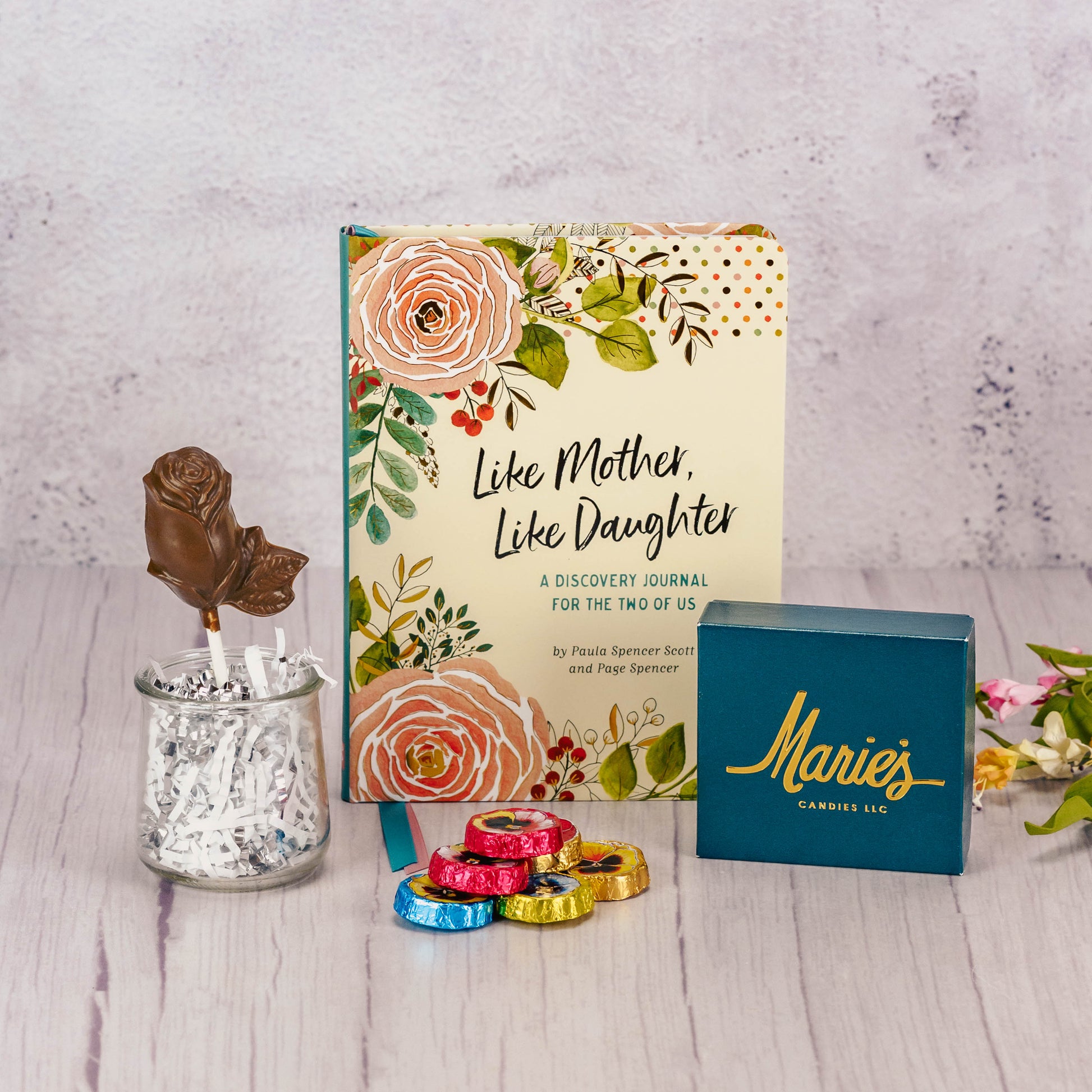 An interactive discovery journal that a mother and daughter can enjoy together. Featuring prompts allow you to share your dreams, wishes and plans with each other, while getting to know them better! Packaged with some sweet treats