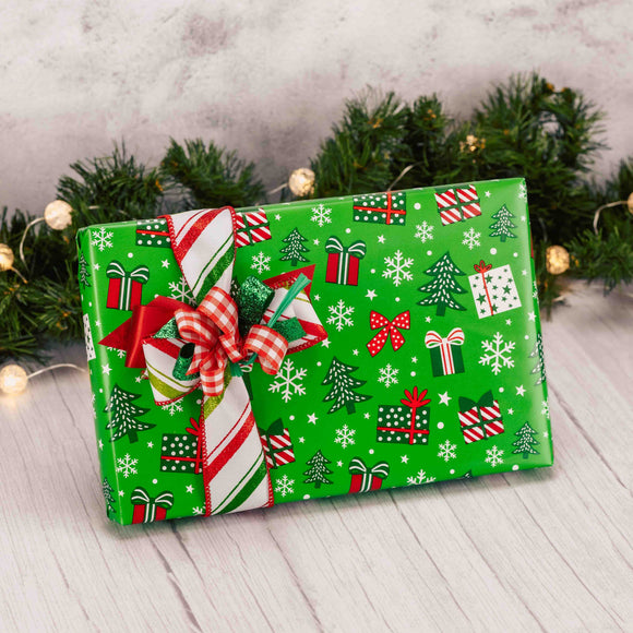Brighten someone's holiday spirits with this fun gift. A half pound box of Sugar Free Assorted Chocolates is wrapped in fun red and green present paper and topped with a cheerful handmade bow.