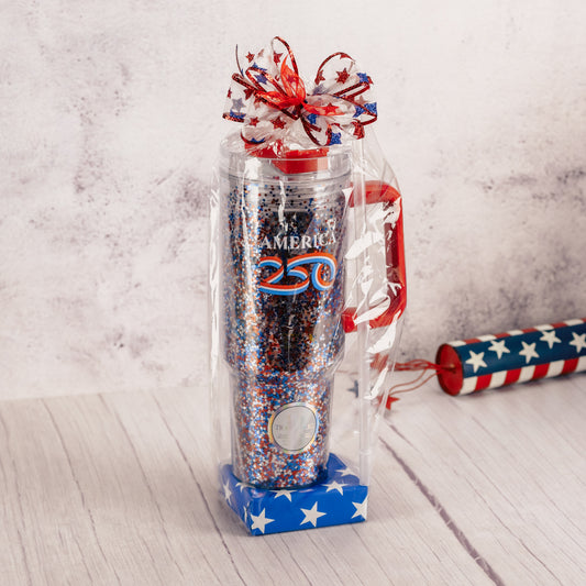 a 40 ounce travel mug that reads America 250 is filled with sweet treats!
