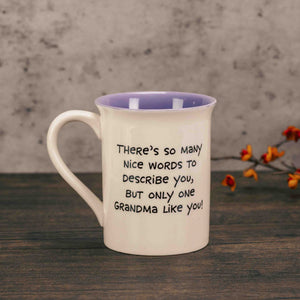 a grandma or grandpa mug filled with sweet treats