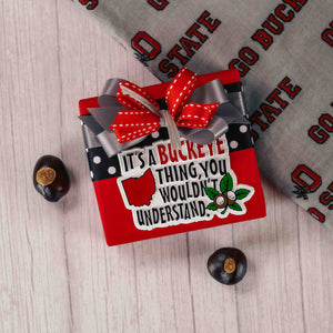 'It's a Buckeye thing, you wouldn't understand' reads the magnet that sits atop a box full of six heavenly Buckeyes. Stick this for all to see and question you about! Wrapped and topped with a lovely handmade bow, a perfect gift for all Buckeye lovers!
