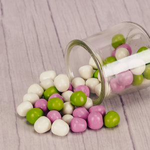 Creamy peppermint coated in a chocolate shell, finished in pastel colors with a satin look. These are a perfect addition to wedding tables and special events! Approximately 105 pieces per half pound