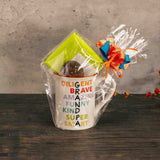 a grandma or grandpa mug filled with sweet treats