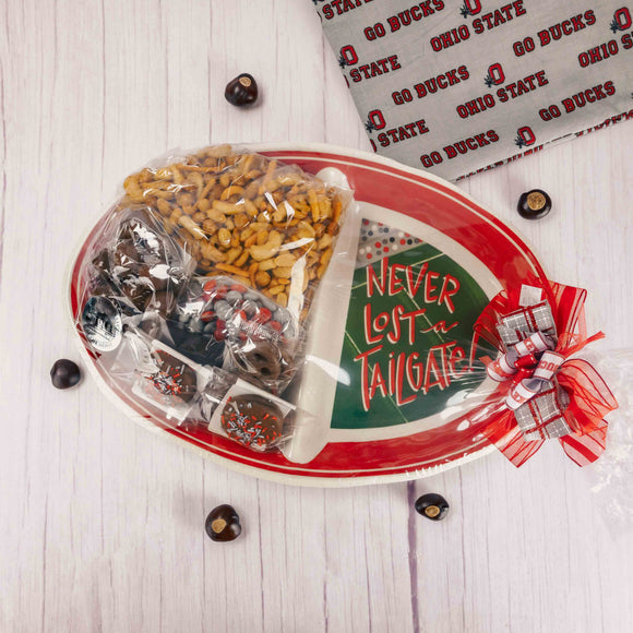 an ohio state melamine two section tray that reads 'never lost a tailgate' is filled with over two pounds of candy