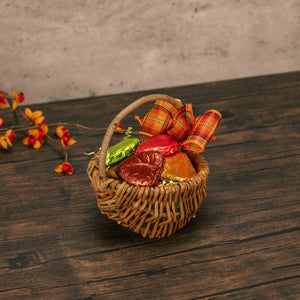 small petite baskets of various shapes filled with 3 oz. of milk chocolate foil leaves.