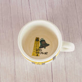 a white Michigan soup mug filled with a half pound of assorted milk chocolates