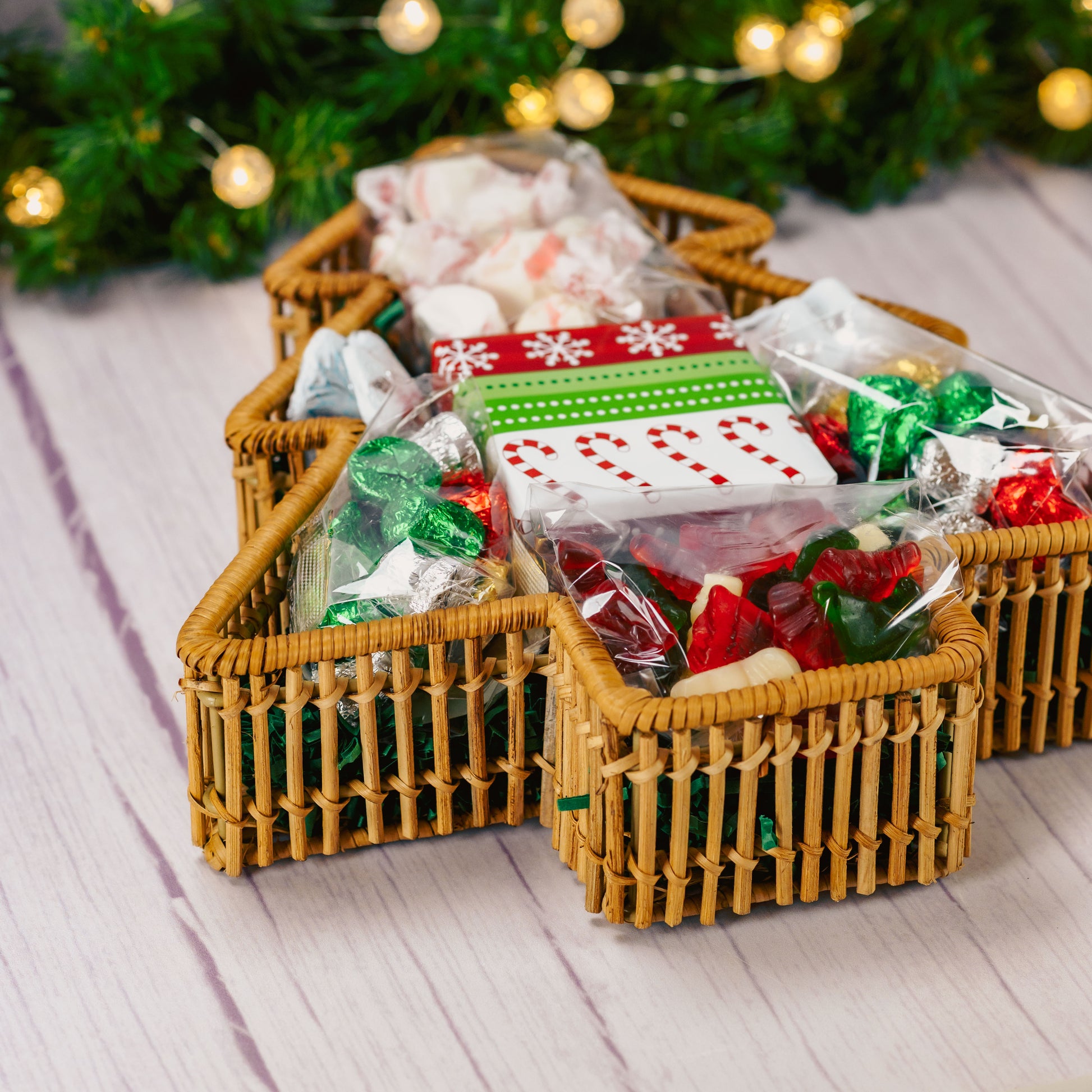 a wicker tree shaped basket is filled with over a pound and a half of candies.