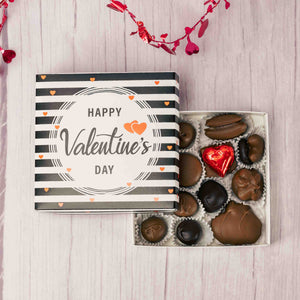 Written right in the middle, for all to see, 'Happy Valentine's Day'. A half pound box of our creamy classic milk and dark Assorted Chocolates will make all your loved ones feel appreciated this year!