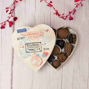 Perfect for all your loved ones near and far. Let them appreciate your love for them with a half pound box of exquisite milk and dark Assorted Chocolates with Valentine priority mail stampings on top.