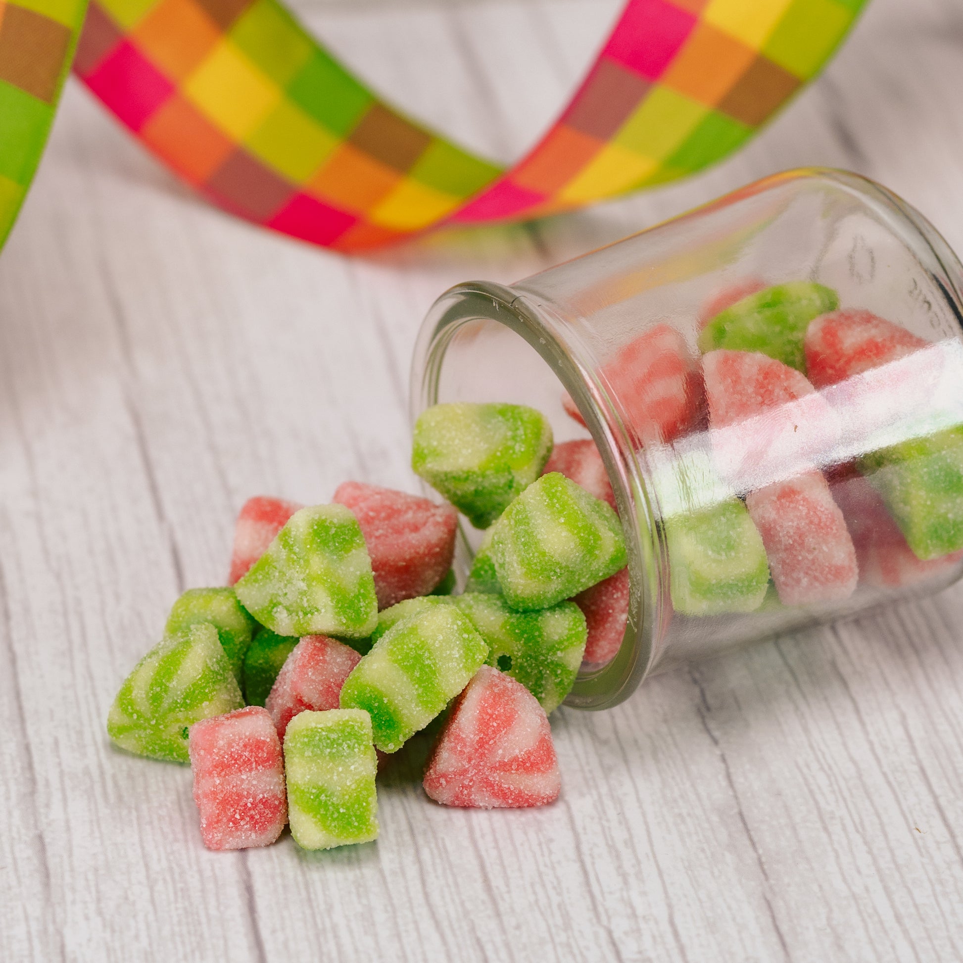 half pound bag of pink and green gummi watermelon slices