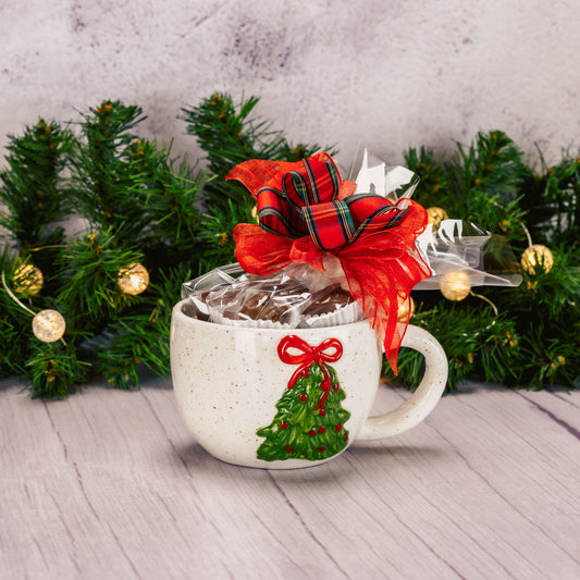 a half pound assorted milk chocolates is packaged inside this hand painted tree mug