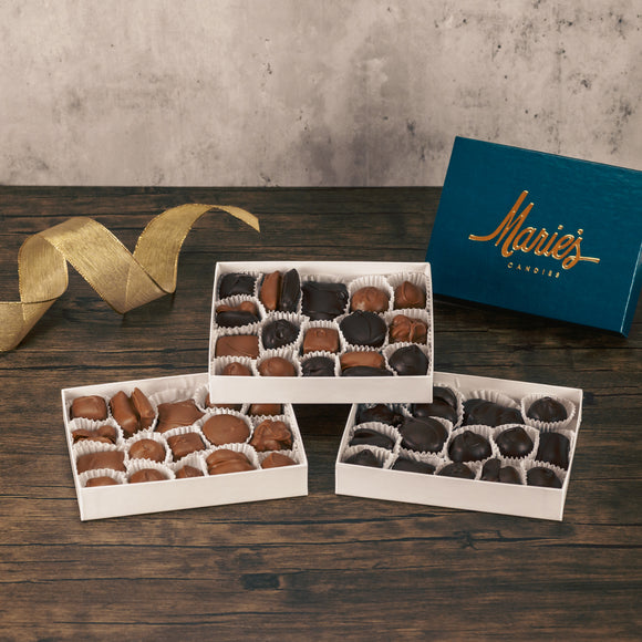 Half pound box of assorted chocolates. Choose between an all milk chocolate, milk and dark chocolate or all dark chocolate assortment. Includes a variety of creams, caramels and crunchy pieces., such as Butter Creams, Peppermint Chews, Peanut Butter and our famous Tur'Kins.