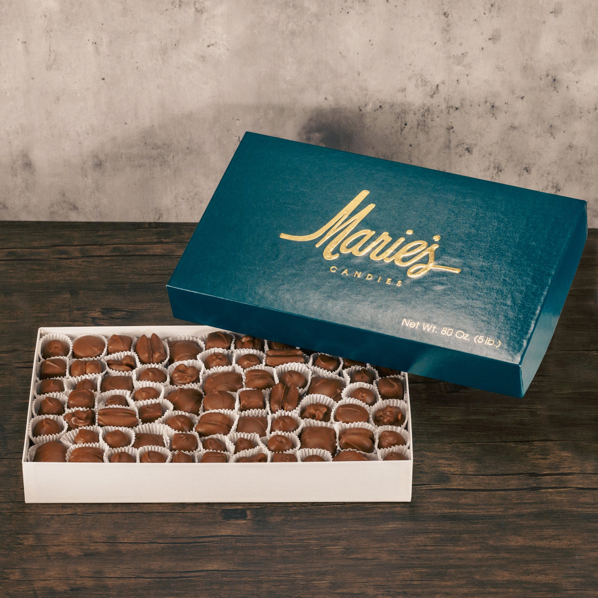 A five pound box of assorted chocolates. Choose between a milk chocolate or milk and dark chocolate assortment. Pieces include creams, caramels and crunchy pieces., and our famous Tur'Kins, like a turtle. Approximately 150 pieces.