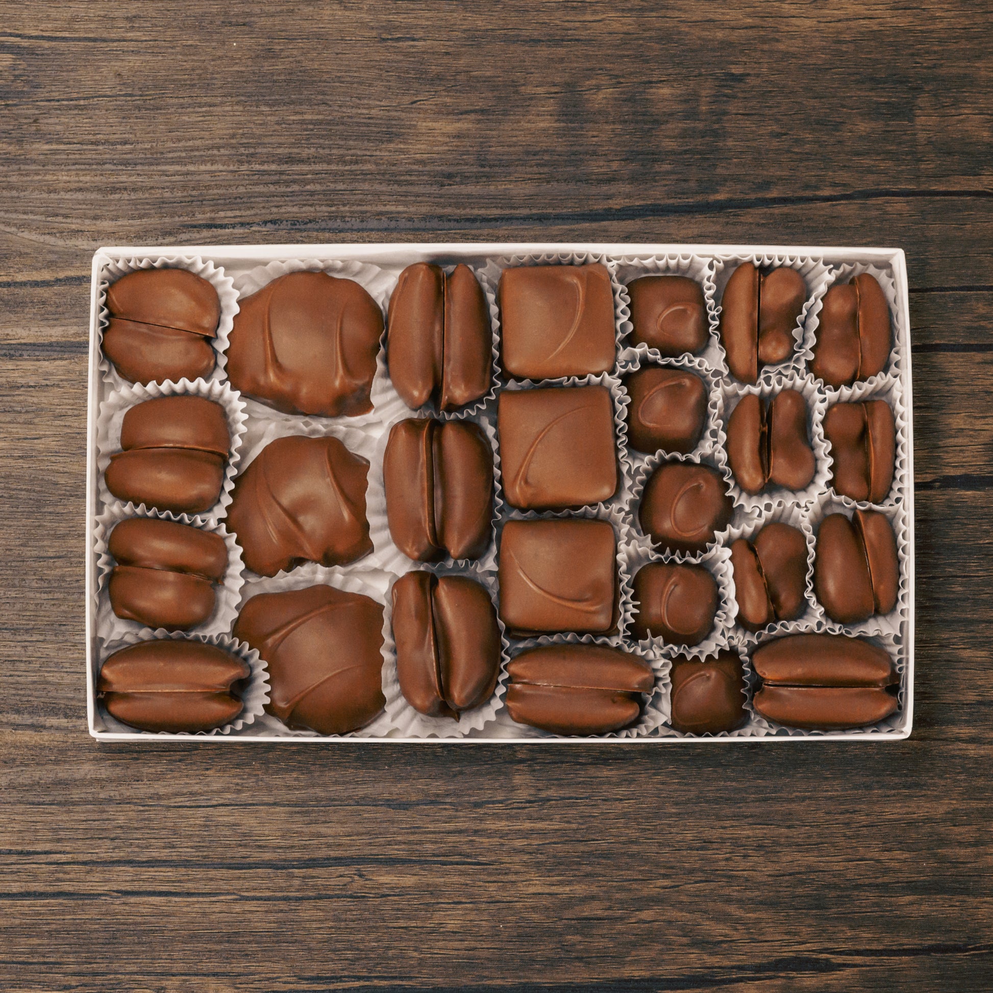 One pound assortment of milk chocolate hard and chewy pieces like nuts, chewy and crunchy pieces. Approximately 32 total pieces.