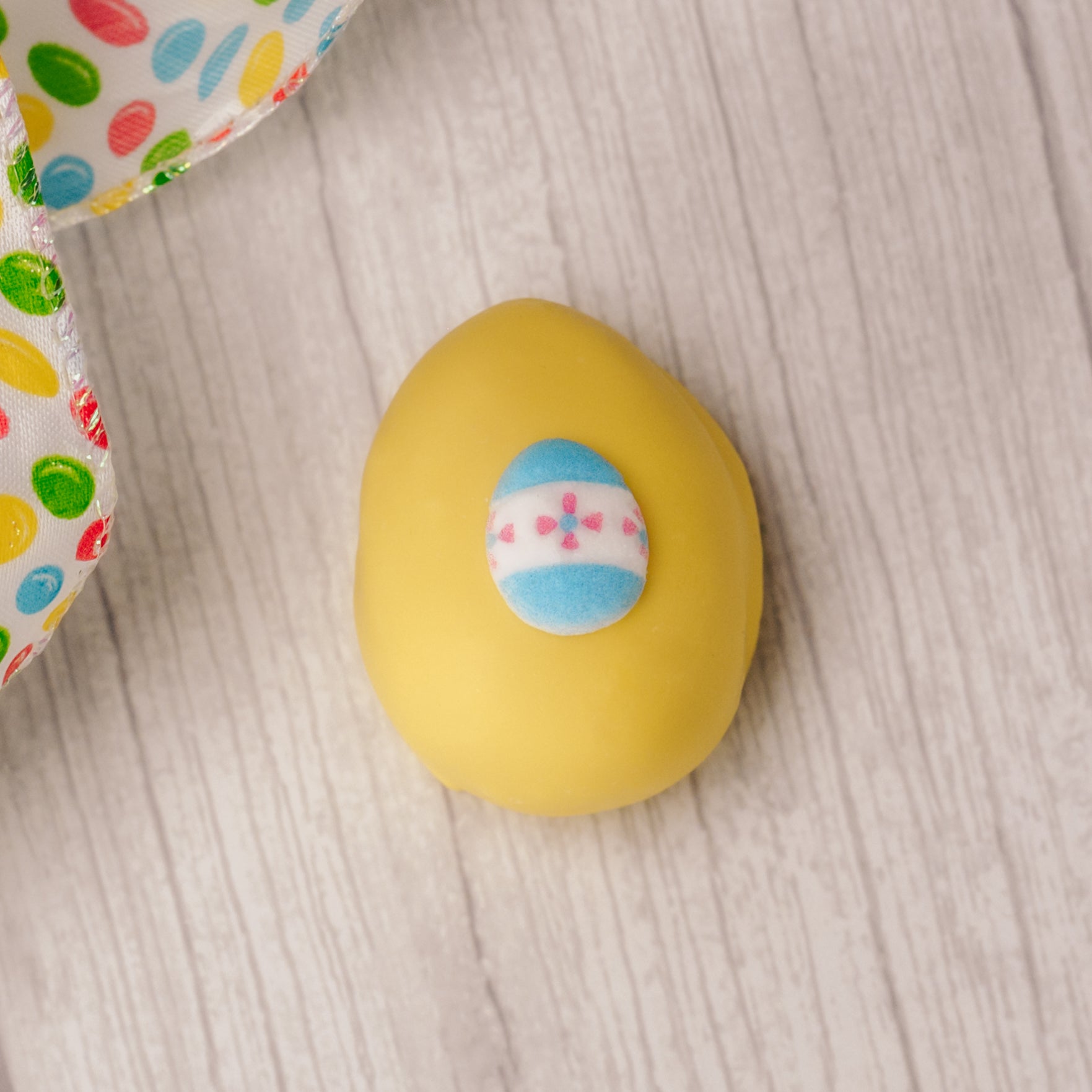 A smaller version of your favorite flavored cream eggs, all hand decorated with assorted Easter icing decorations. Each color egg is a different flavor. Choose from Yellow Coconut Cream, Pink Pecan Cream, Milk Chocolate Chocolate Cream, Green Vanilla Cream or White Peanut Butter Cream.