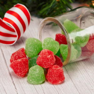 red and green bell shaped gum drops flavored cherry and lime in half pound bags.