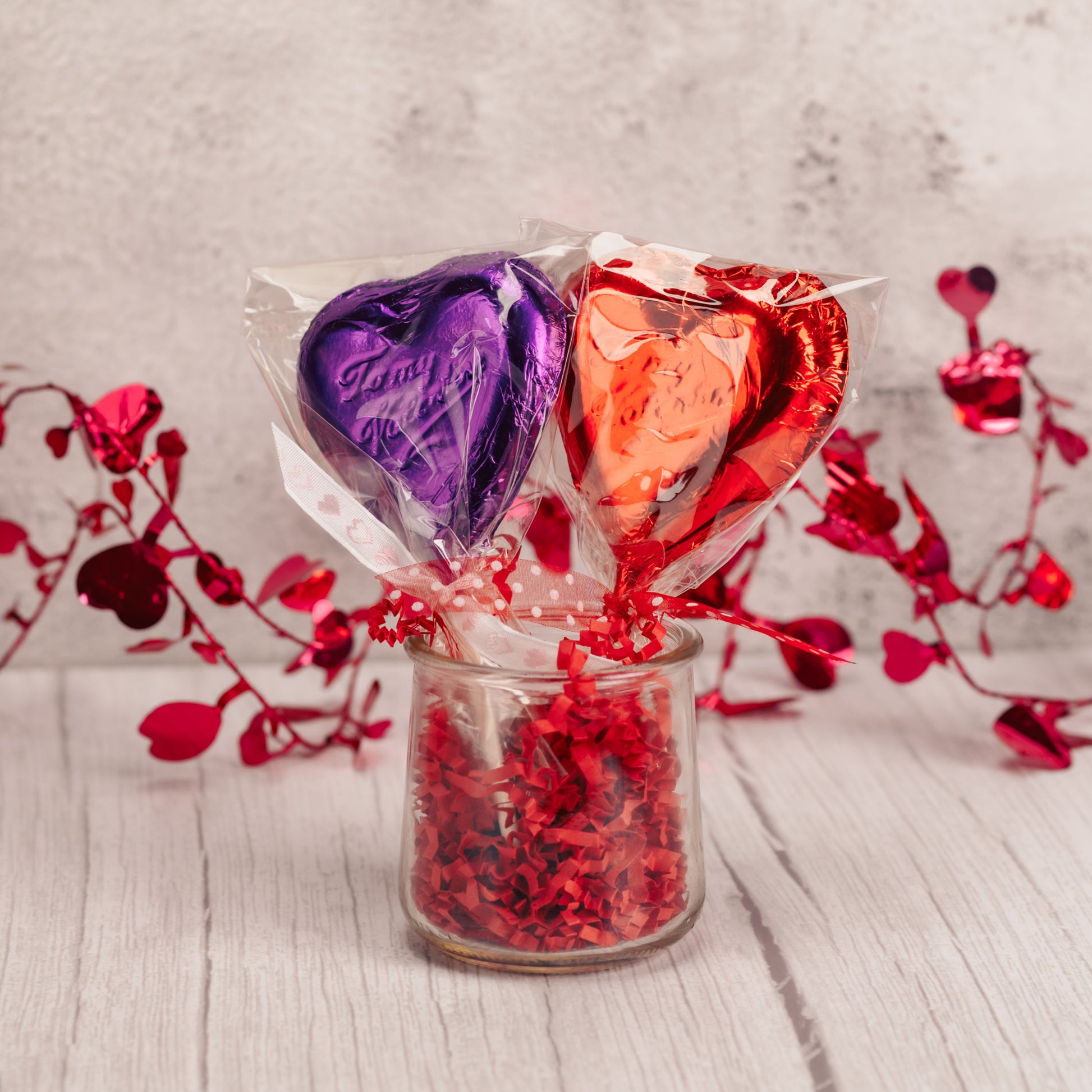 heart shaped sucker reads 'To My Valentine' and comes in milk chocolate with red foil or white coating with purple foil.