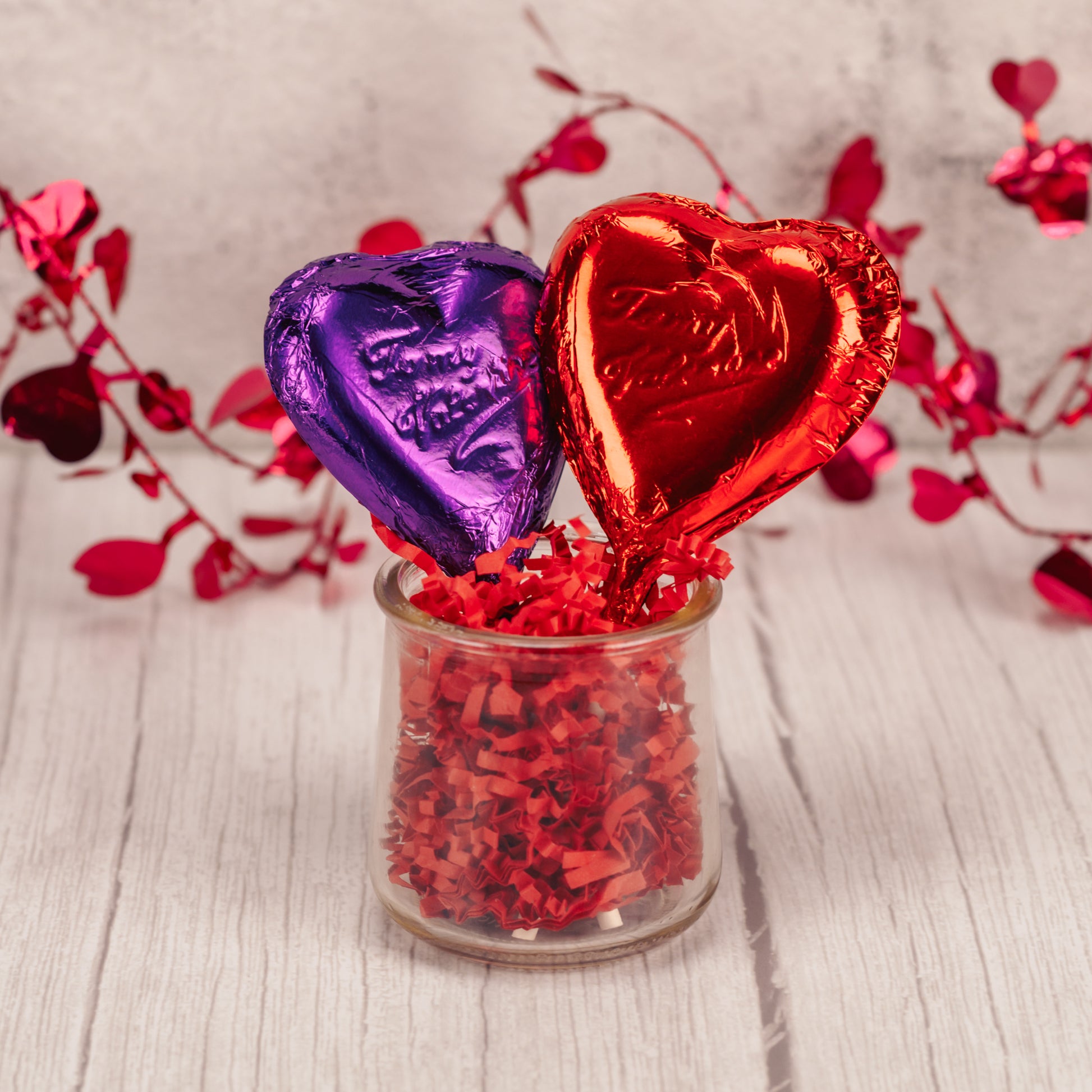 heart shaped sucker reads 'To My Valentine' and comes in milk chocolate with red foil or white coating with purple foil.