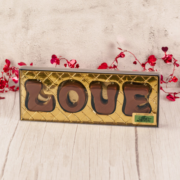 Milk Chocolate letters spell out your LOVE for someone special. Comes in a box with a clear lid.