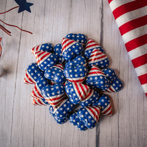 Premium solid milk chocolate hearts wrapped in red, white, and blue stars and stripes foil make this a festive candy dish filler.  Packaged in half pound bags with approximately 27 pieces