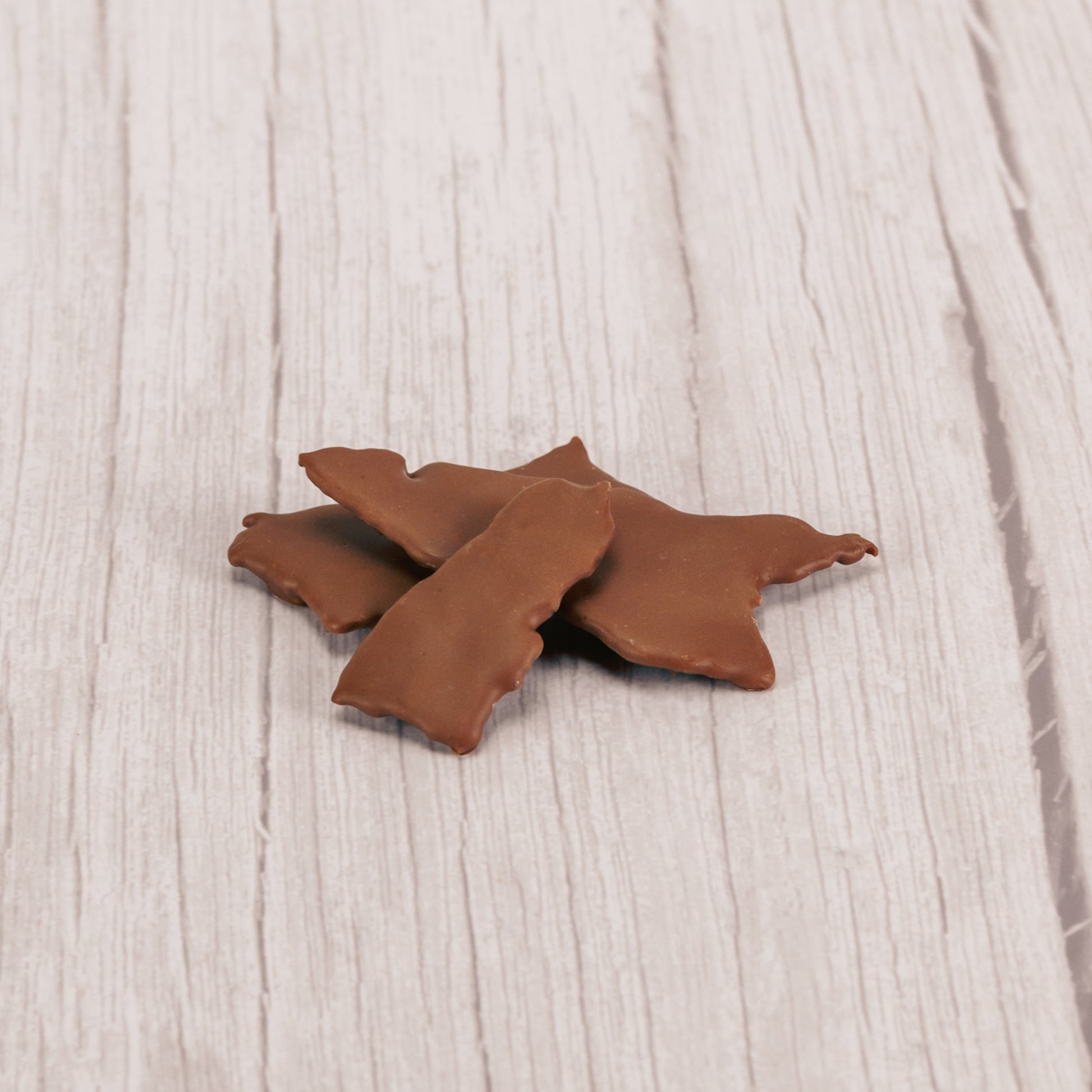 Thin, crispy pieces of bacon covered in smooth milk chocolate.