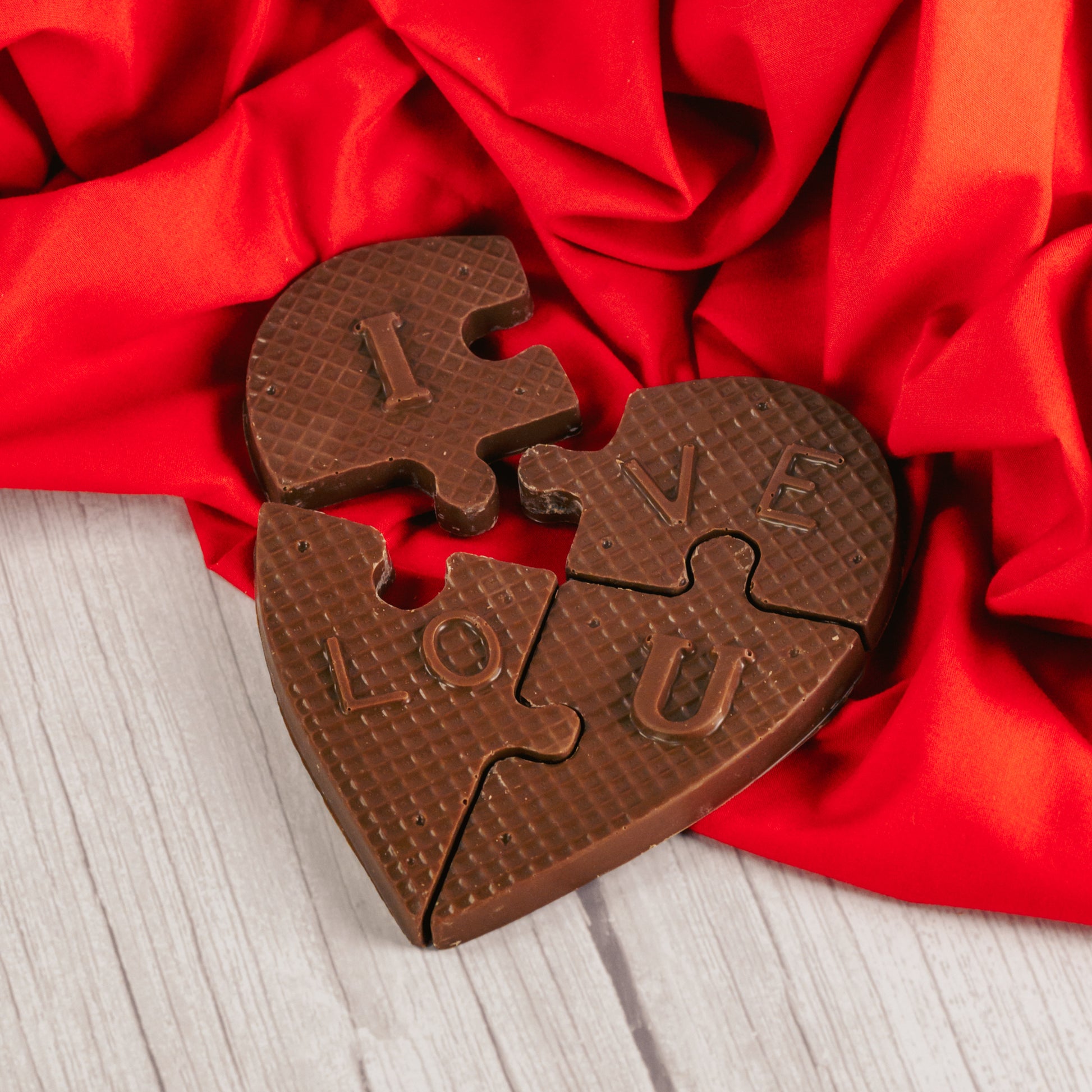 milk chocolate puzzle that reads I LOVE U