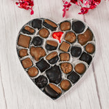 a satin red with white polka dots one pound heart box filled with an assortment. Choose a milk chocolate, dark chocolate or milk and dark chocolate assortment