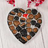 a pound vest heart shaped box will be perfect for your business-attire valentine. Filled with a pound of delicious assorted chocolates. Choose a milk chocolate assortment or a milk and dark assortment.