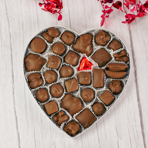 a pound vest heart shaped box will be perfect for your business-attire valentine. Filled with a pound of delicious assorted chocolates. Choose a milk chocolate assortment or a milk and dark assortment. 